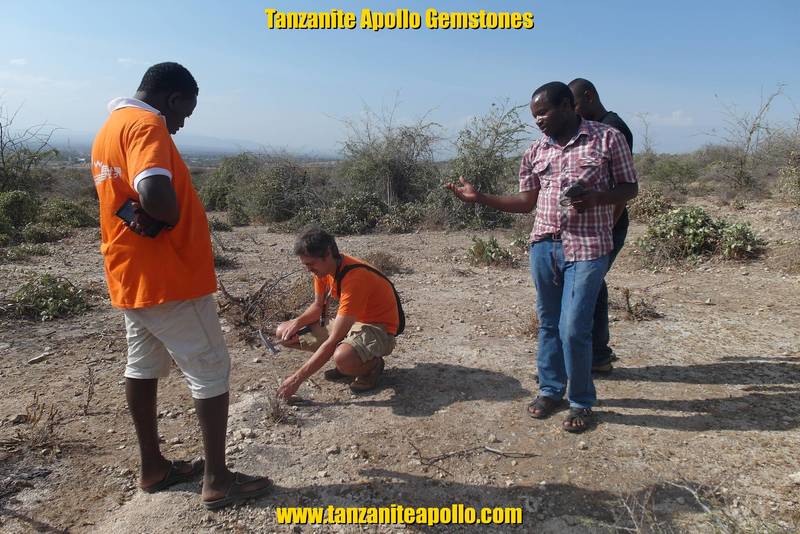 Geologist explaining the layer structure of Mirerani Hills, Tanzania