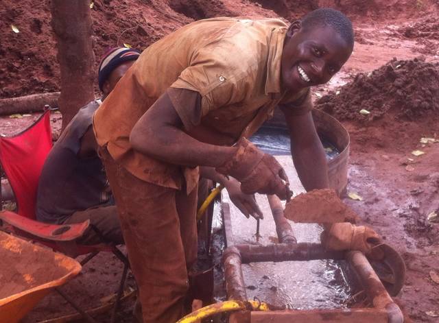 Moses, the initial manager, testing ores on the mining land